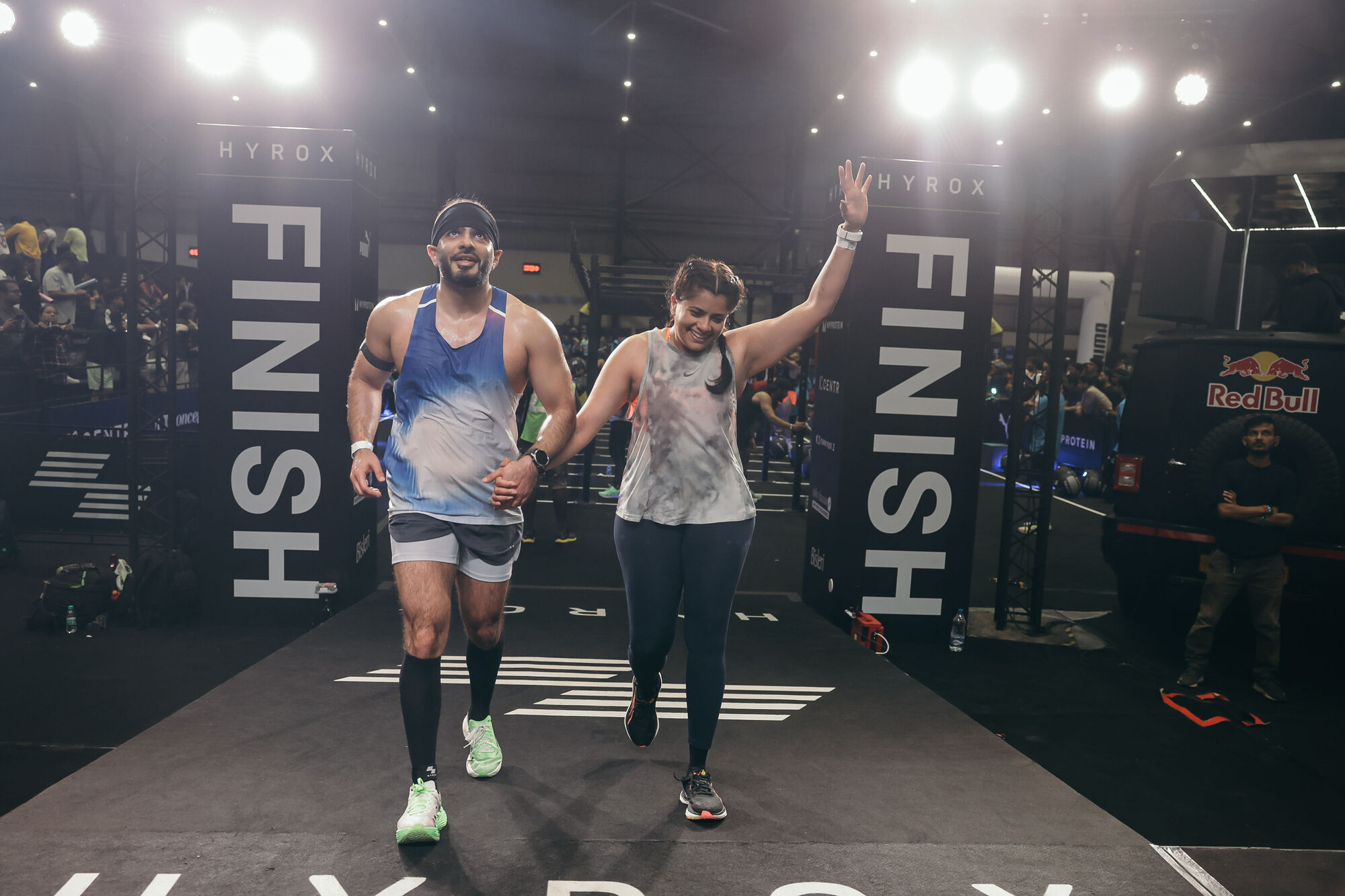 Clients celebrating together at a race finish line